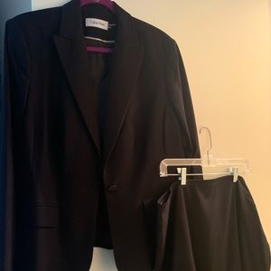 Women’s skirt suits, size 18
